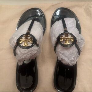 Tory Burch Glossy Black Sandals with Gold Emblem
